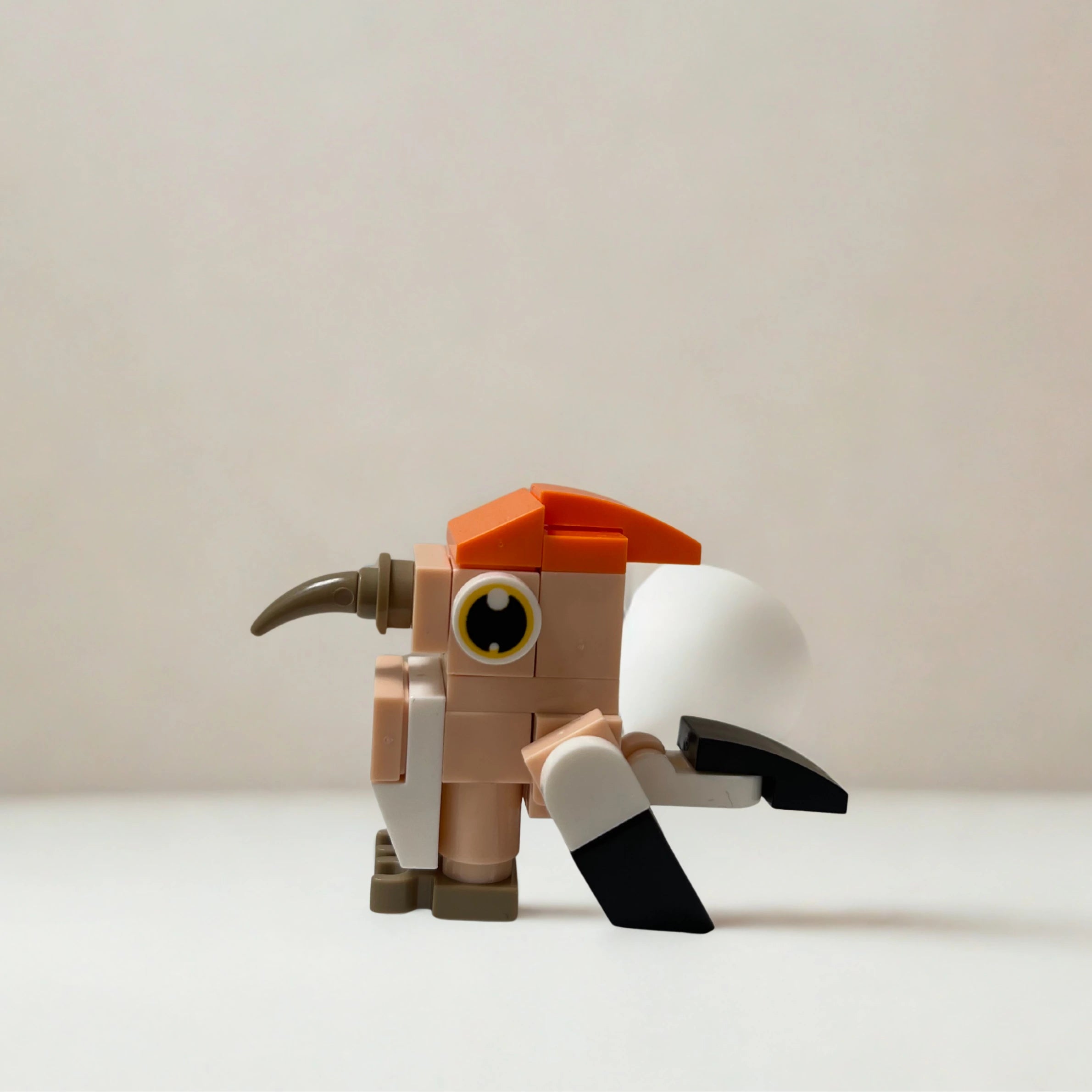 Side angle of the Hoopoe building block toy.