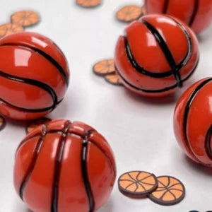 Multiple miniature basketball toys.