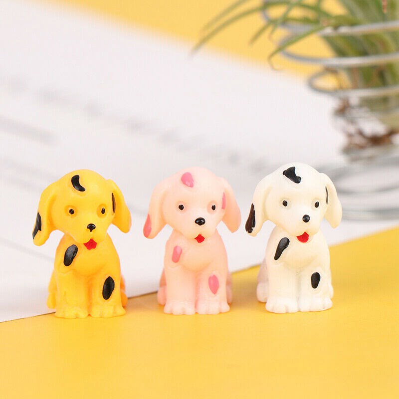 Image of miniature puppies in a set of three.
