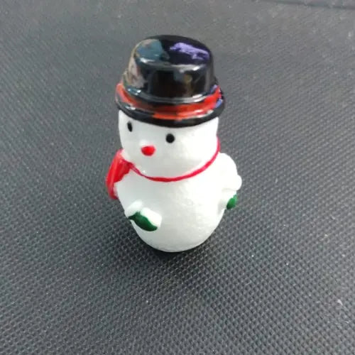 Image of a white miniature snowman