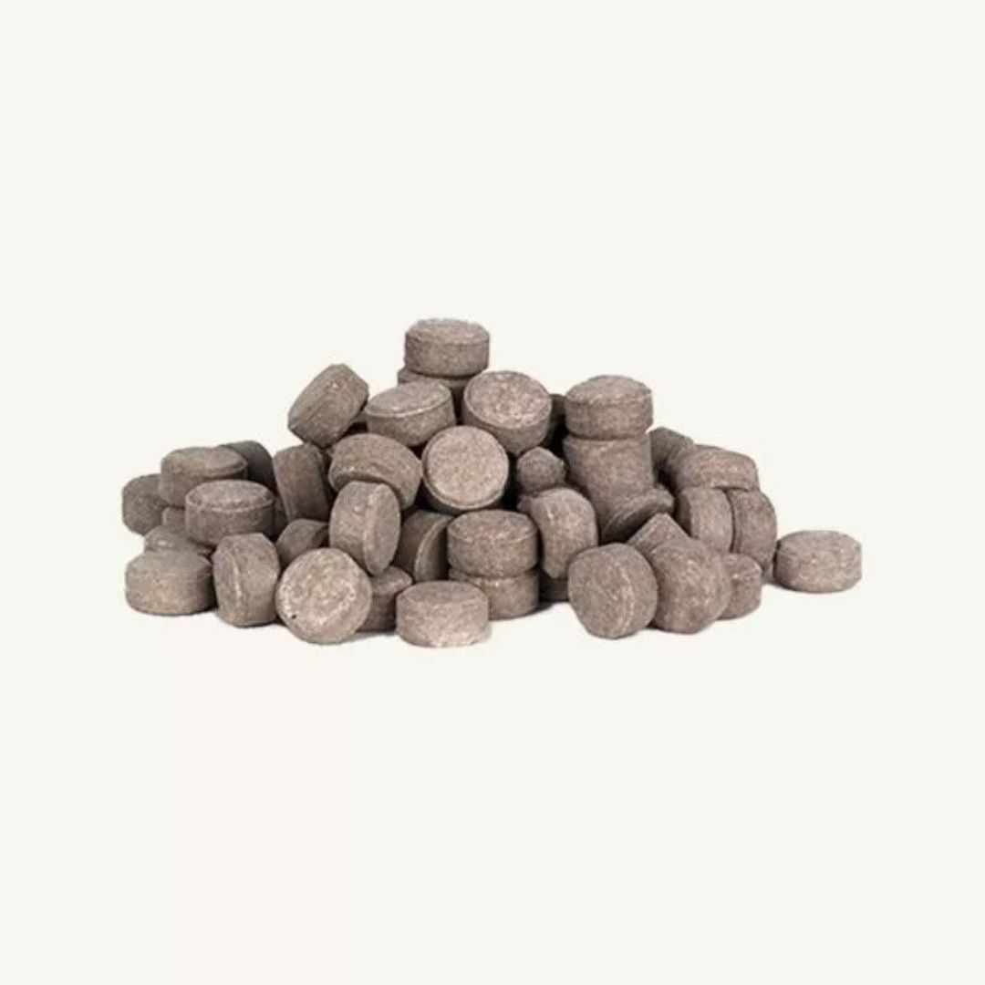 Organic Plant Food Tablet in grey color.