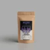 This is an image of a packet of Wisitiria Lavender Seeds kept against grey color background.