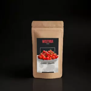 A packet of Wisitiria Seeds Cherry Tomato Seeds kept against a black background