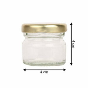 An image of a small glass jar with golden lid.