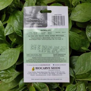 Backside picture of Biocarve African Marigold F2 Yellow Seeds packet with leaves in background