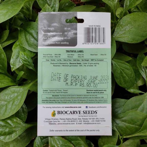 Backside picture of Biocarve Rosemary Seeds packet with leaves in background