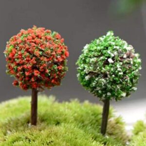 A cute Miniature Trees on the grass.