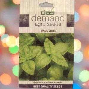 A packet of Demand Agro Basil Green Seeds kept against a colorful background.