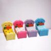 A cute and colorful Miniature Toy Bed.
