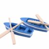 A beautiful and cute two Miniature boats with Oars on a white surface.