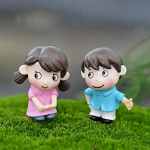 A cute Miniature Shy Couple on a grass.
