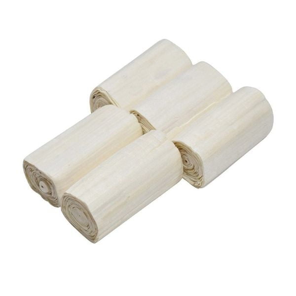 A bunch of Natural Sola Wood in white background