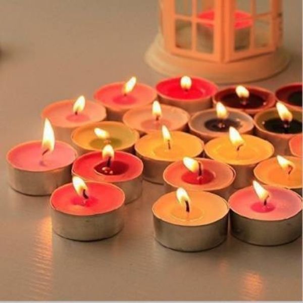 Glowing multicolored floating candles