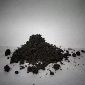 This is an image of finest powder of Vermi Compost kept against white color background.