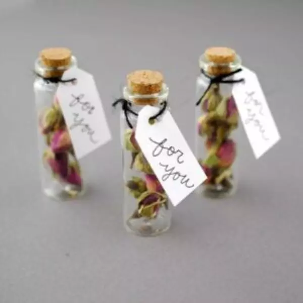 3 gift bottles with corkcap, seeds and a thanksgiving card.