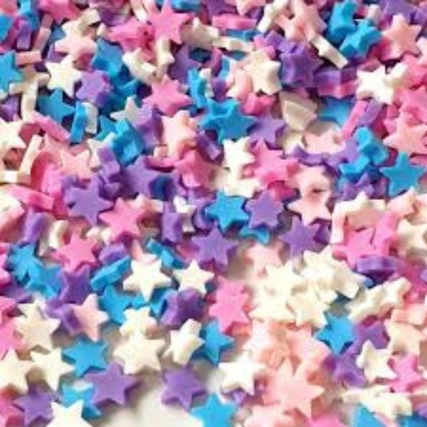 Several colorful Miniature Polymer Clay Stars.