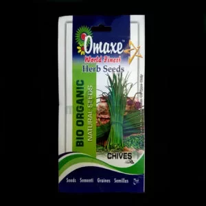 A packet of Omaxe Chives kept against a dark background.
