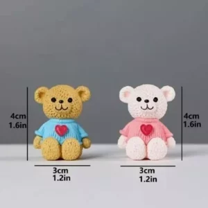 This is an image of two Miniature Teddy Bears kept against grey color background.