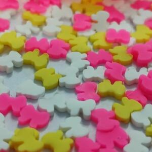 This is an image of multiple Miniature Polymer Clay Mixed butterfly in white, pink and yellow color.