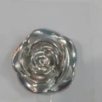 This is an image of Silver Flower Sticker against a grey color background.