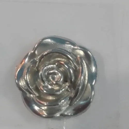 This is an image of Silver Flower Sticker against a grey color background.
